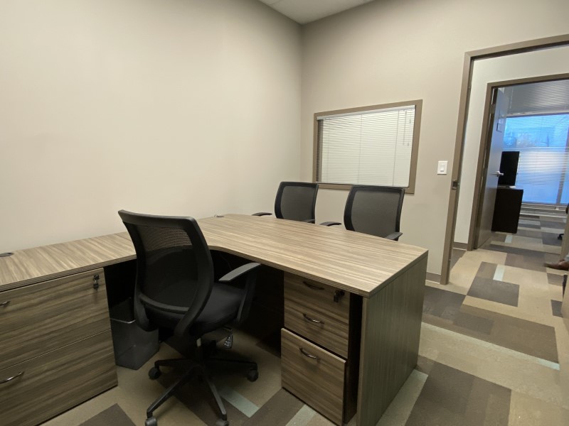 Desk and Interior Window of Office 28 in the EYE for Business Center